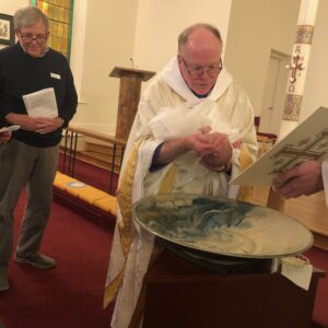 Adalynn receives the Sacrament of Baptism